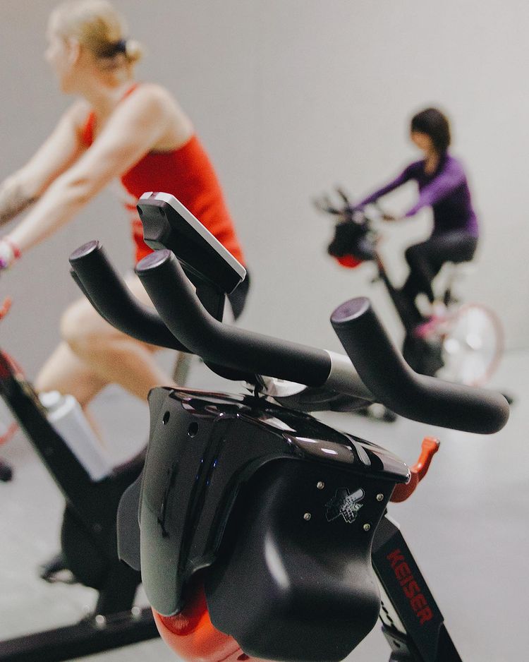 Young women in a spin class