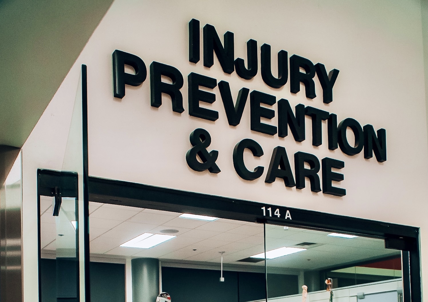 Office sign over the entrance to Injury Prevention and Care