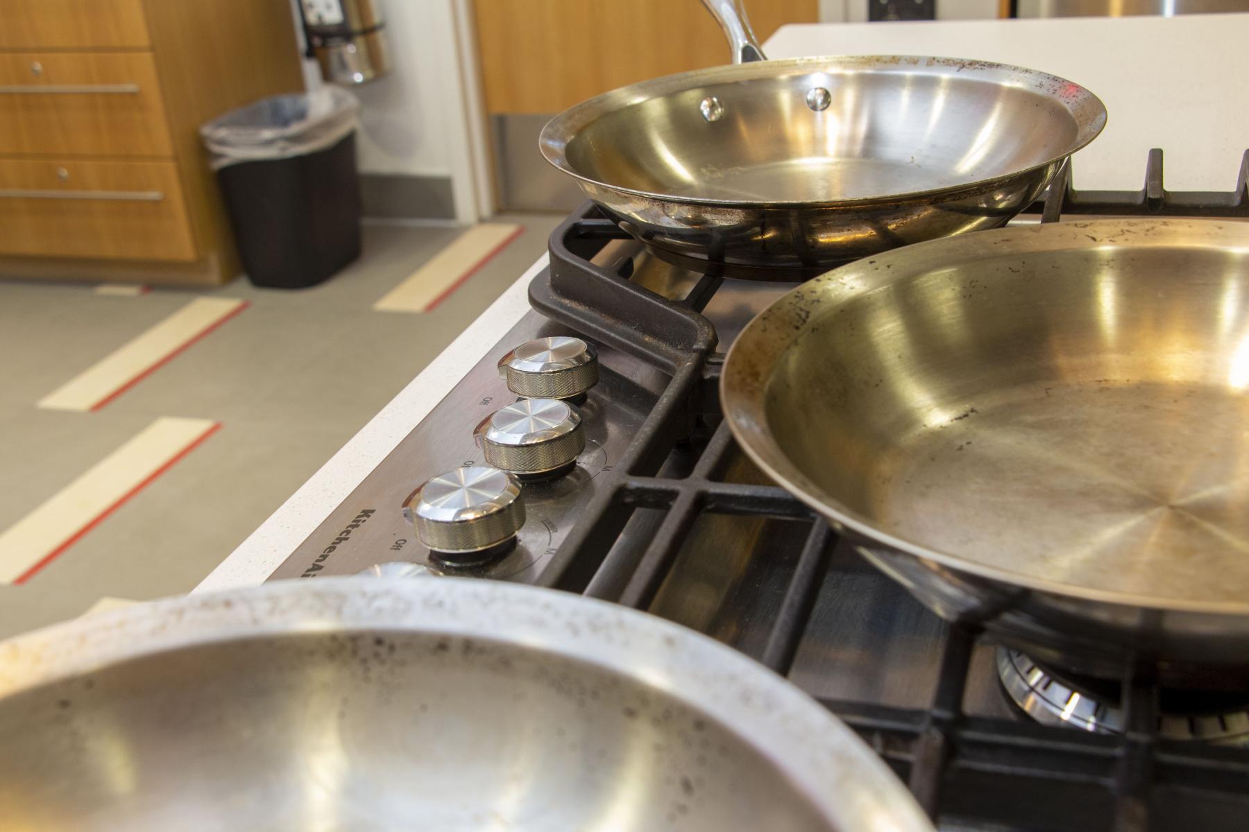 Pots sit on the stove top of the Wellness Kitchen at the Recreation and Wellness Center.