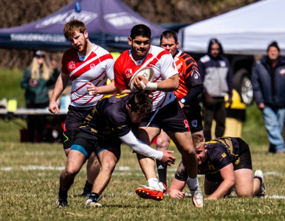 Men's rugby team competes in a regional tournament