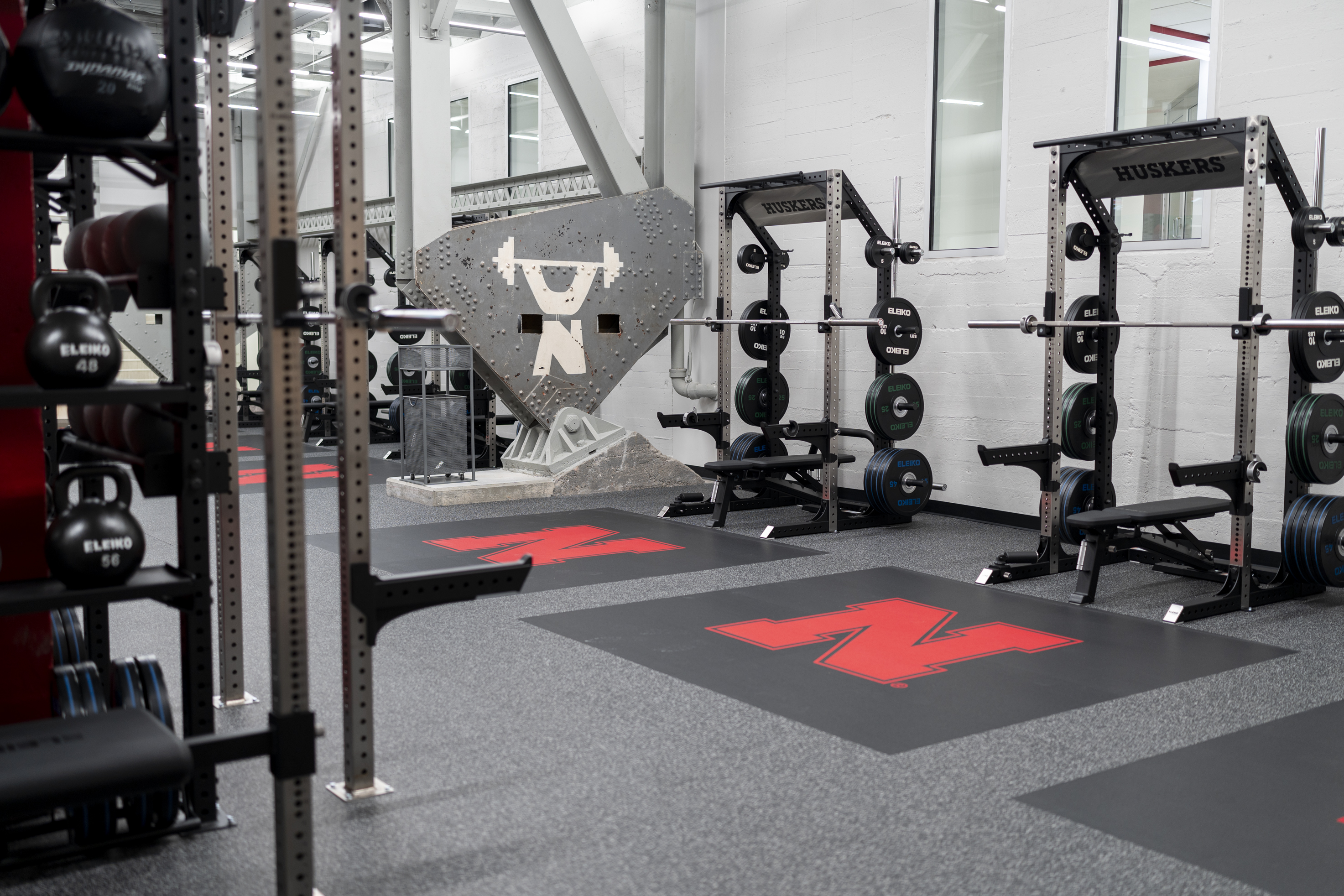 Three weight racks in the Power Room of Campus Rec