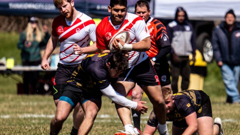 Men's rugby team competes in a regional tournament