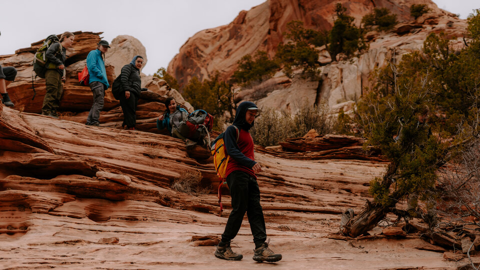 hikers going through Utah mountains