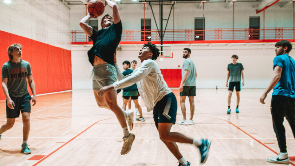 Students playing basketball