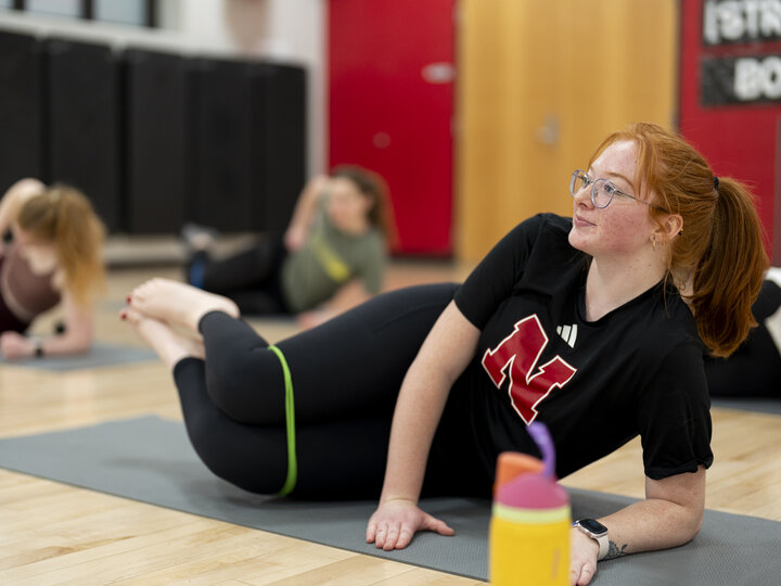 person doing a resistance band stretch