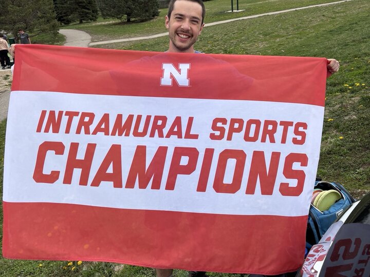 Red banner with "Intramural Sports Champions" printed in bold white and red text.