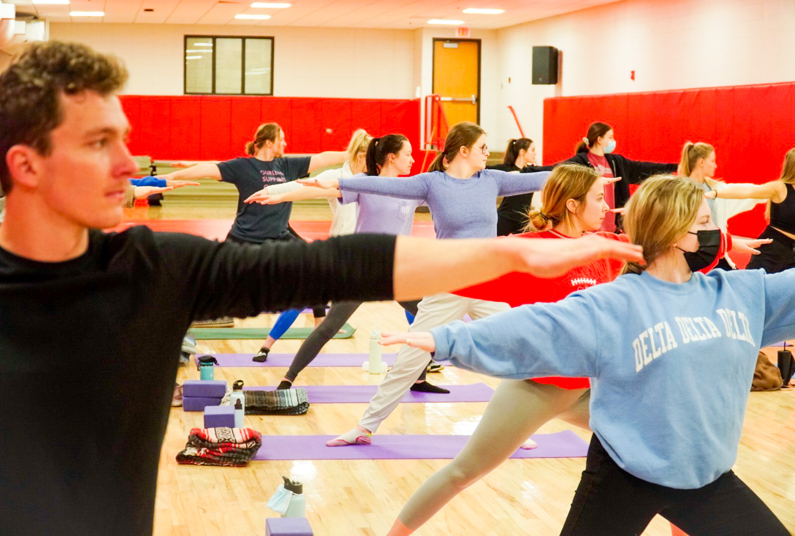 Pasrticipants pose during a Campus Recreation yoga class.