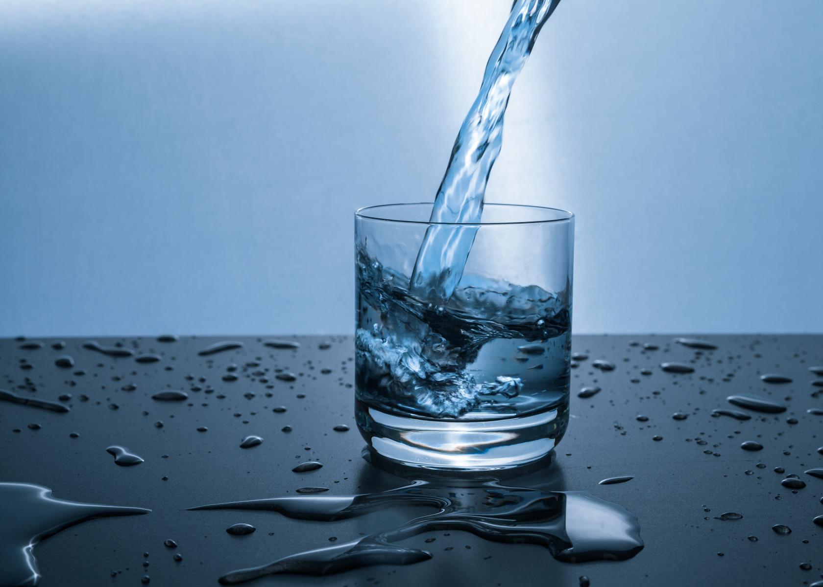 A glass of water on a table