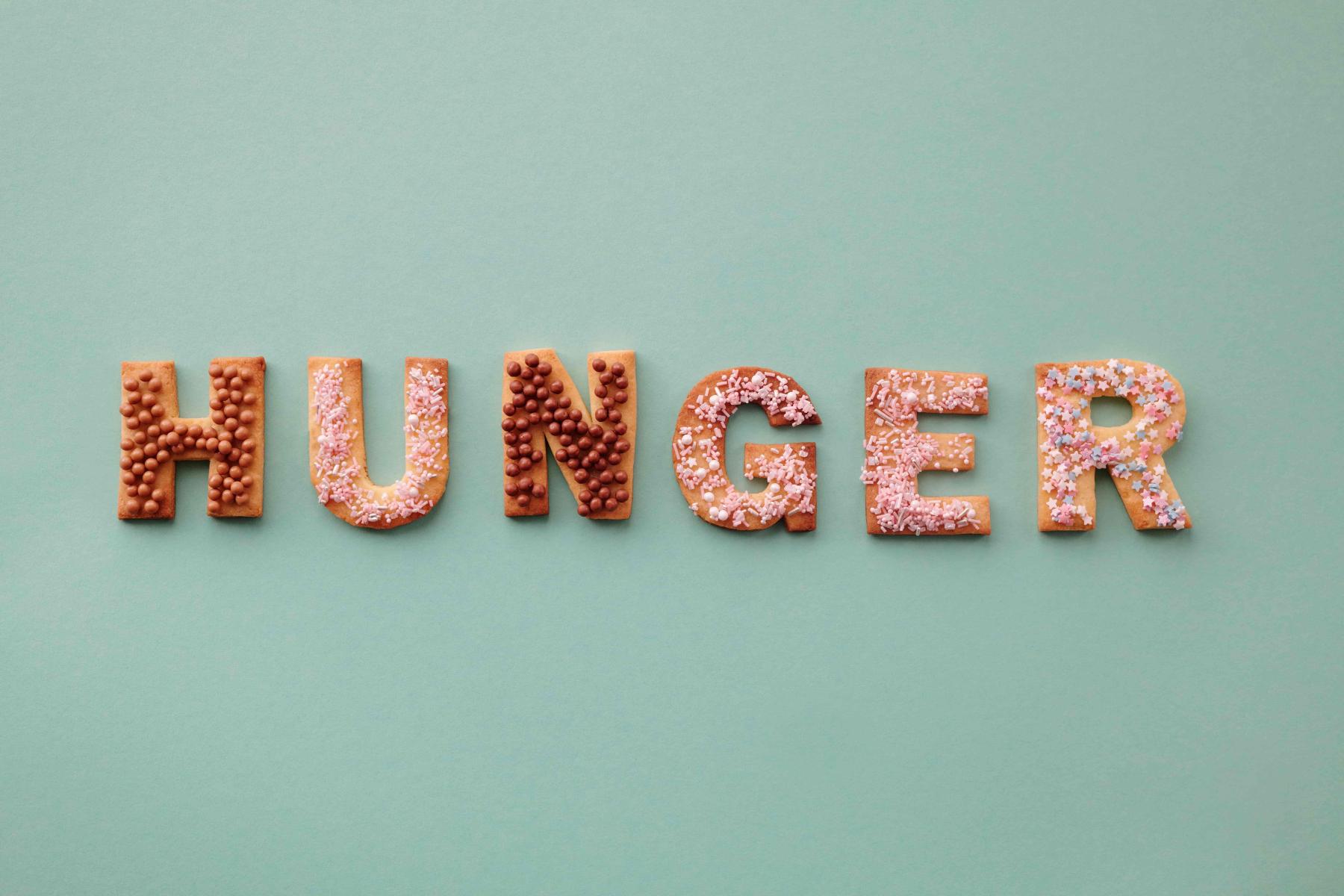 The word hunger spelled out with cookies