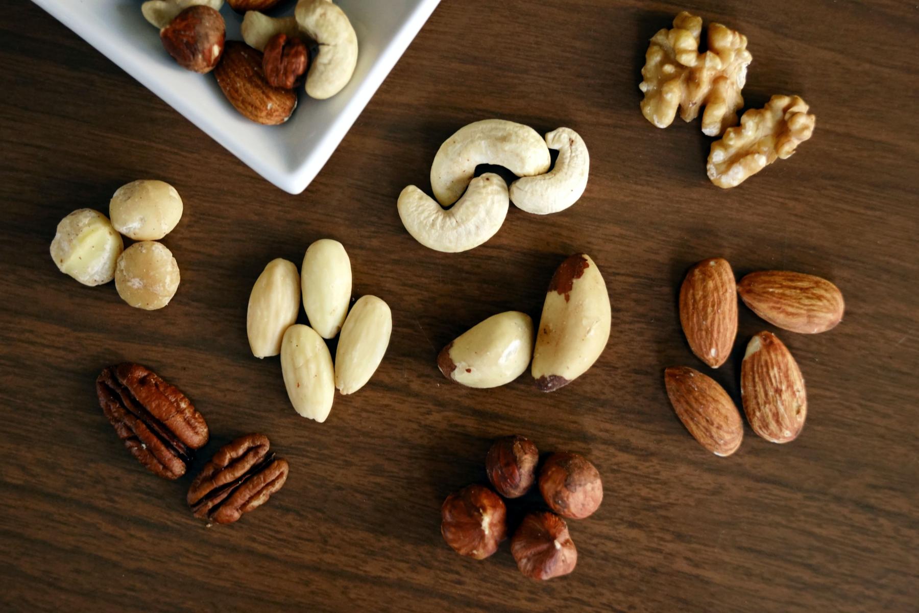 Various nuts on a wood table