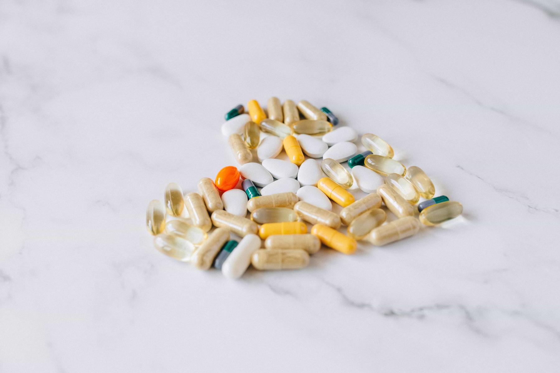 Supplement pills in a heart shape